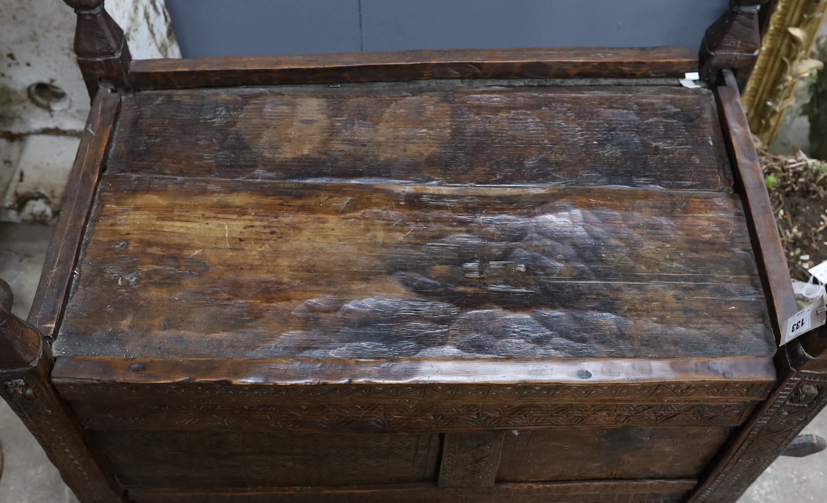 A 19th century chip carved grain chest/coffer, width 94cm, depth 52m, height 80cm (a.f.)